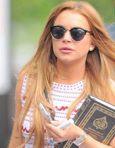 Lindsay Lohan holding Quran