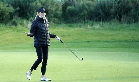 Kelly Rohrbach playing golf
